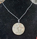 Crazy Lace Agate Disc Pendant on Adjustable Hempcord