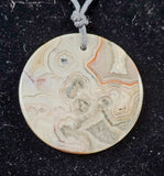 Crazy Lace Agate Disc Pendant on Adjustable Hempcord