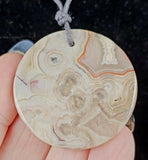 Crazy Lace Agate Disc Pendant on Adjustable Hempcord