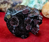 LG. Arfvedsonite aka Fireworks Stone w/Garnet Kitty Statue