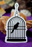 Black and White Bird 🐦 in a Cage Enchanted Sticker