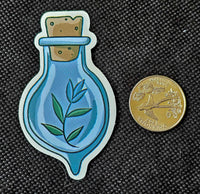 Blue Potion Bottle With Plant Enchanted Sticker