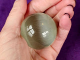 SM. White Cat Eye Crystal Sphere 👁️✨😻🔮🐈🤍