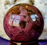 Sunset Rhodonite Crystal Sphere 🩷🔮🧡